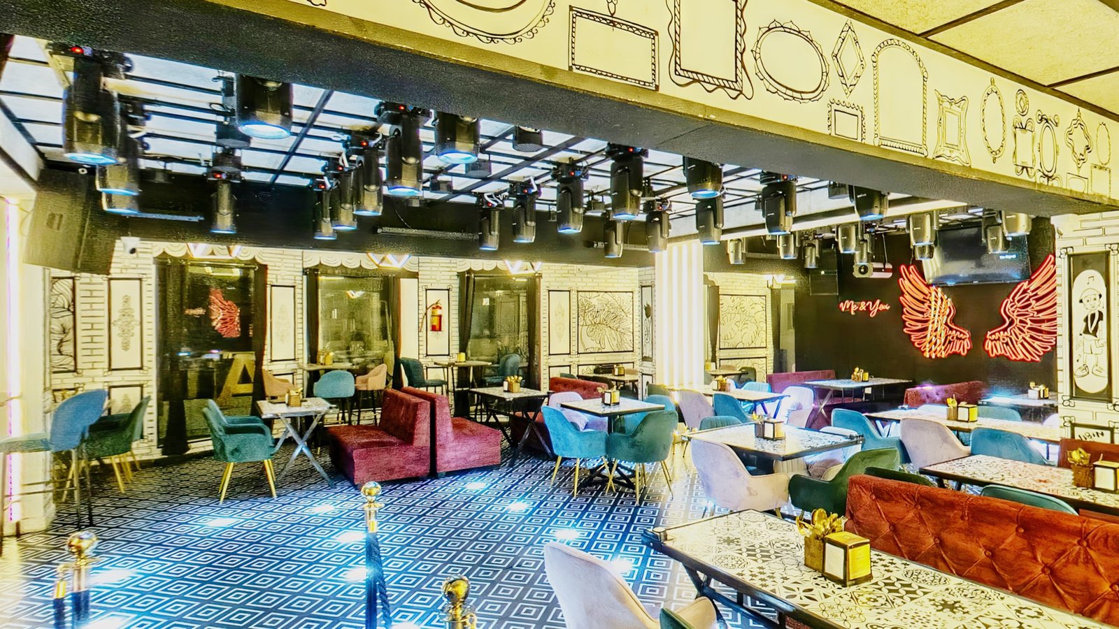 Lounge seating and neon wings
